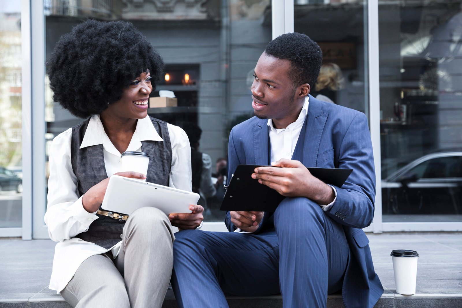 portrait-young-african-businessman-businesswoman-taking-office-break
